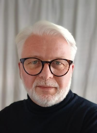 NIALL HELAY HEADSHOT (1).jpg