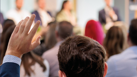 Hand up conference.png